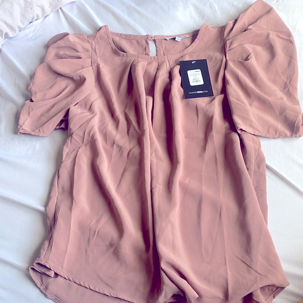 Pretty pink blouse. Perfect for work attire. Never worn